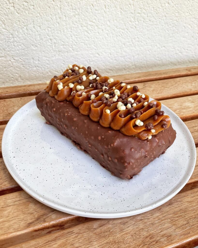 Gourmet Marbled Cake with Praline Crunch, Rocher Glaze, and Smooth Caramel