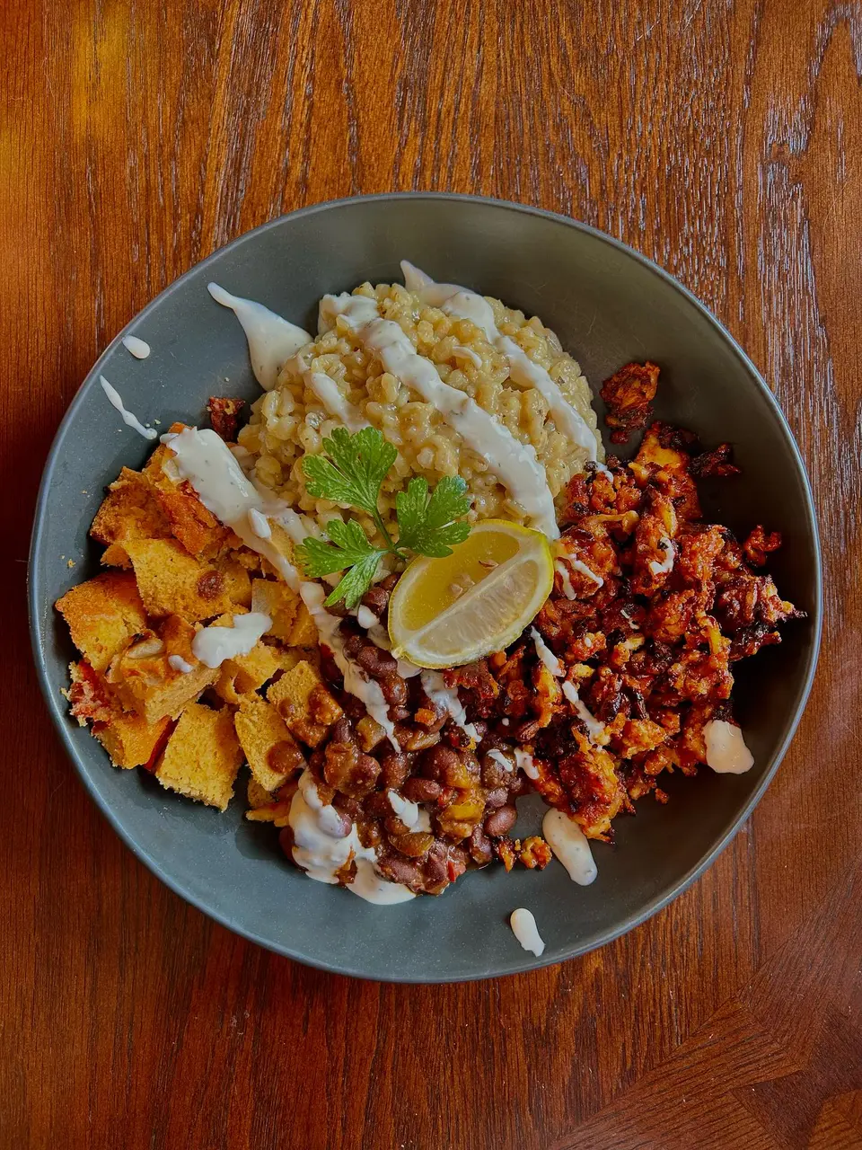 Cheesy Lemon-Garlic Barley Bowl with BBQ Tofu, Black Beans, and Mung Bean Egg Bake
