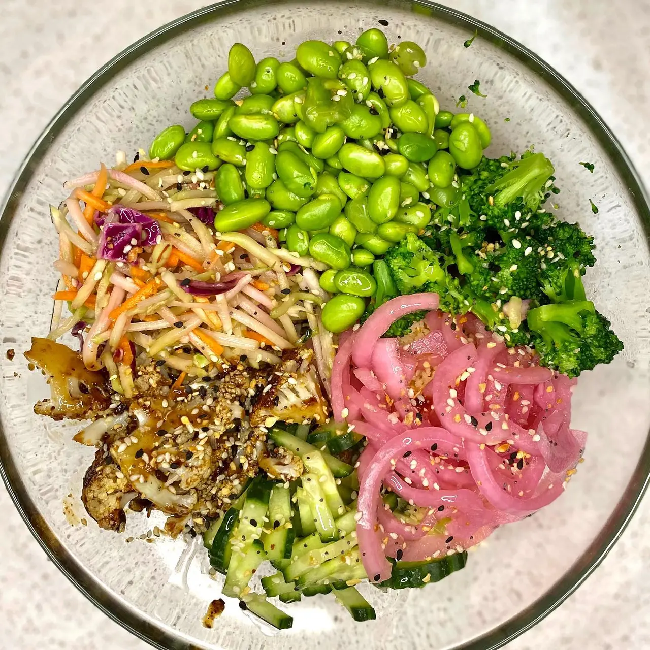 Vibrant Vegetarian Buddha Bowl with Roasted Cauliflower, Edamame, and Tangy Asian Dressing